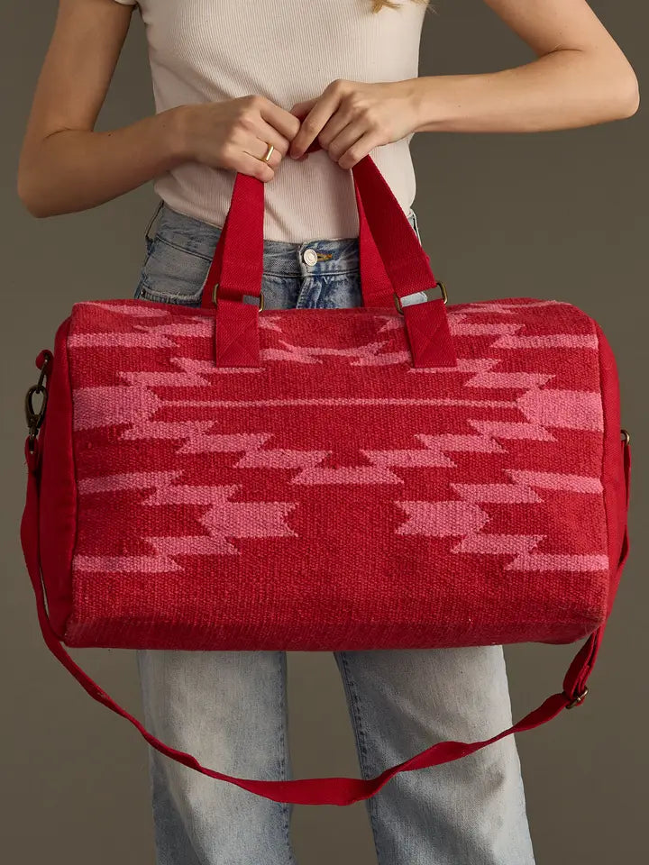 red and pink aztec duffle