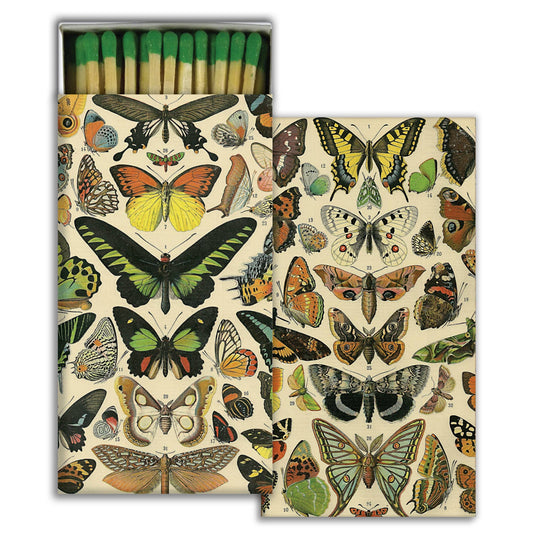 Matchbox with butterfly design on a white background