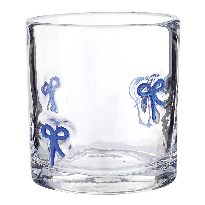 Clear glass tumbler with blue bow designs 