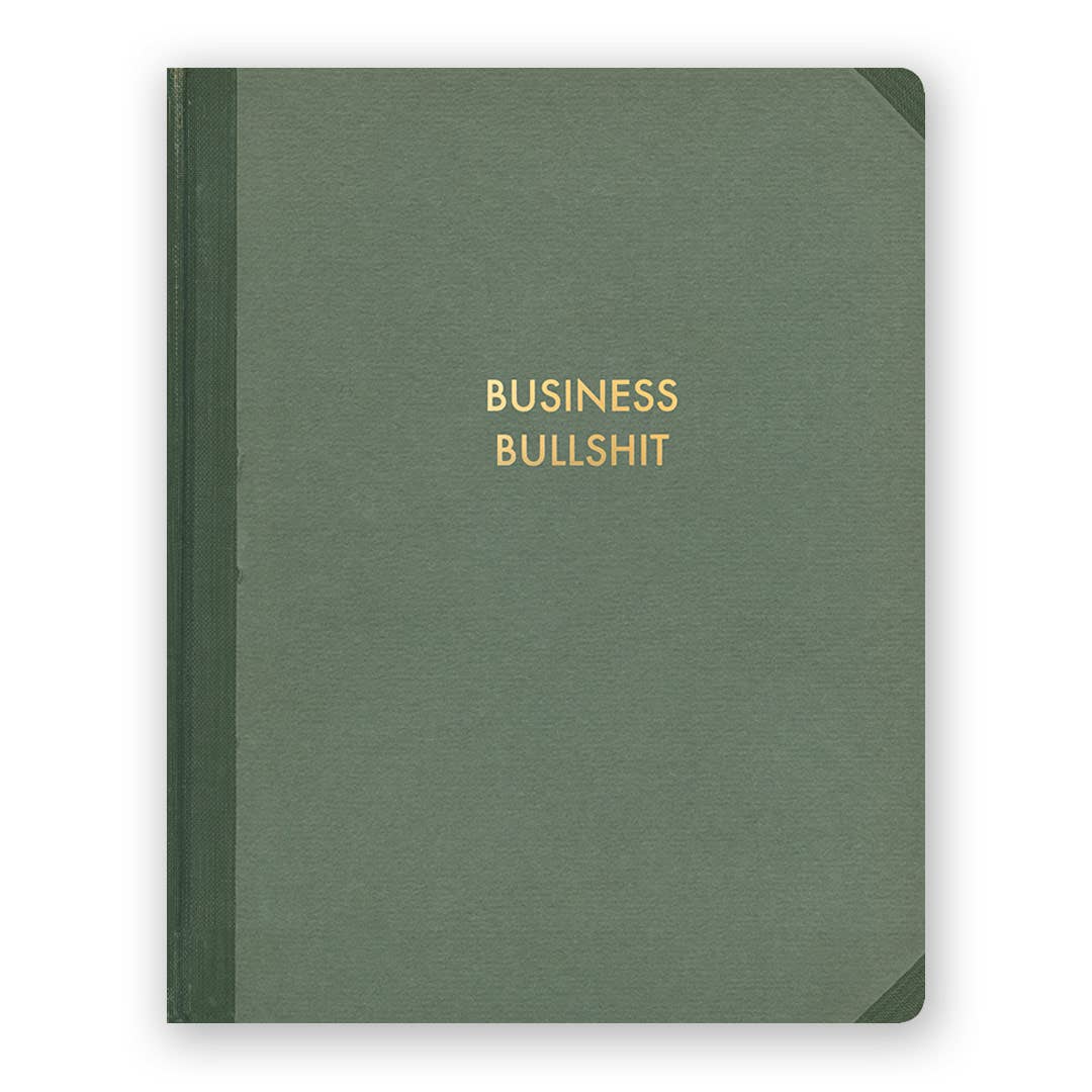 Green notebook with 'BUSINESS BULLSHIT' text on a white background