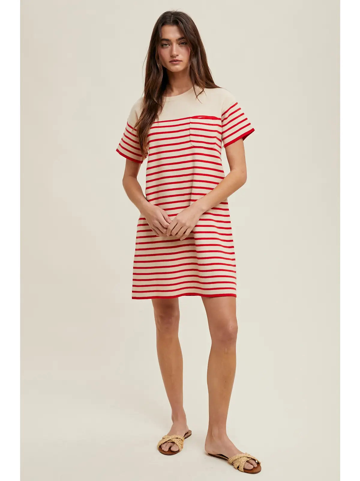 Woman wearing a red and white striped dress 