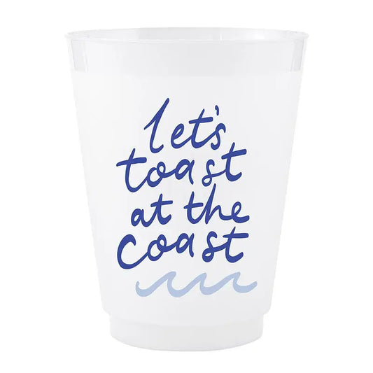 White cup with blue text 'Let's toast at the Coast' on a white background