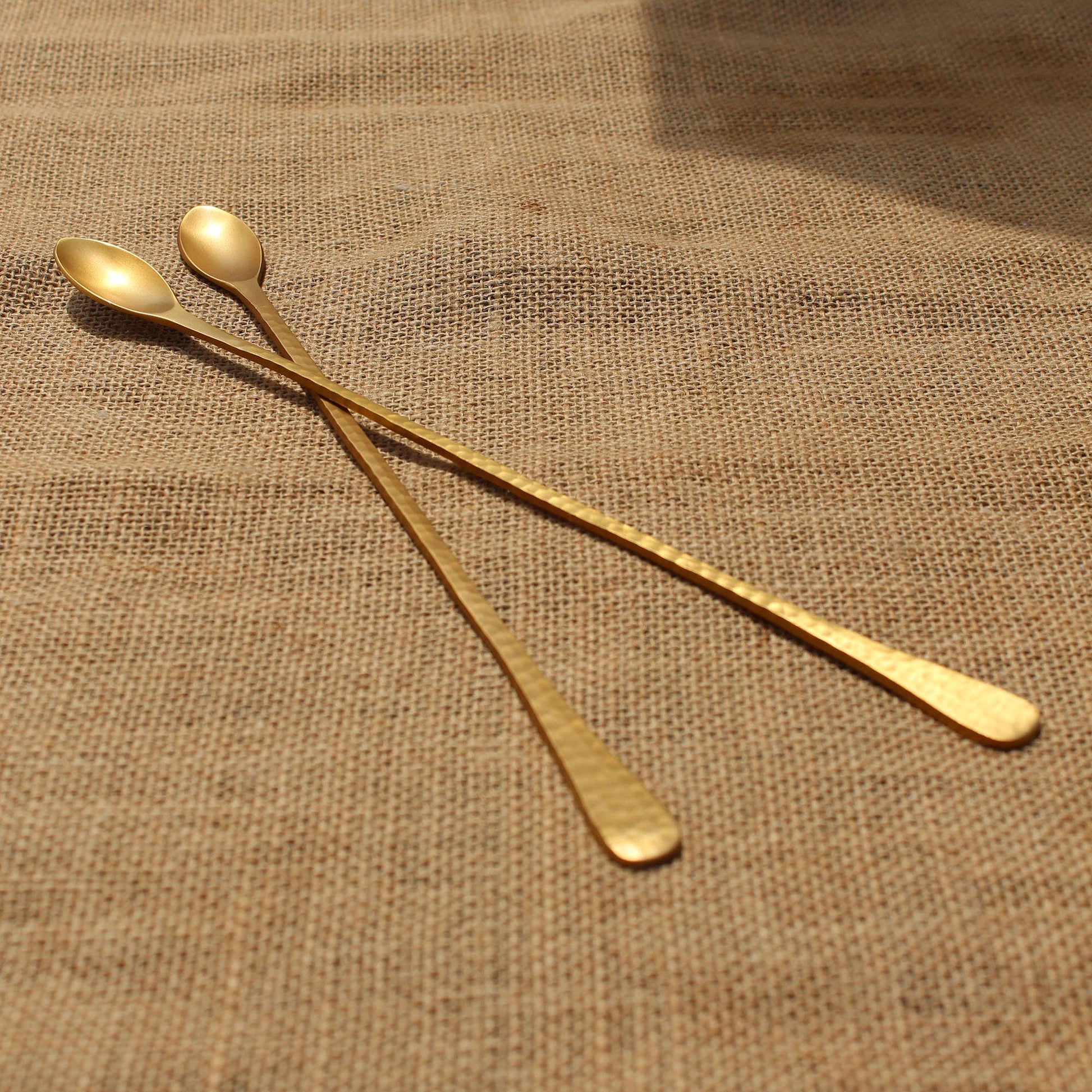 two gold spoons 