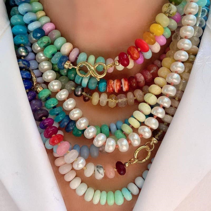 Colorful beaded necklaces on a mannequin