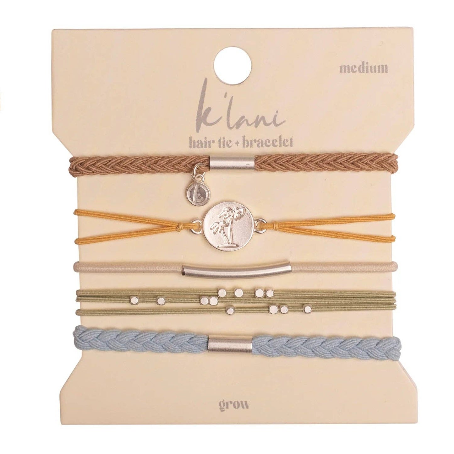 Set of hair ties and bracelets on a branded card with 'kinni' branding.