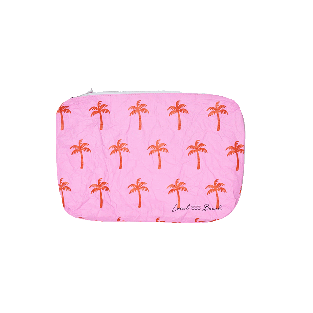 Pink pouch with palm tree pattern on a transparent background