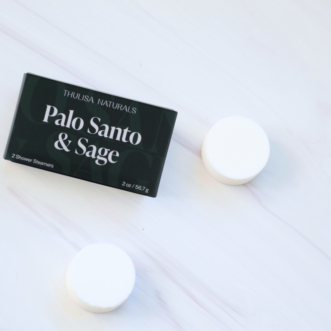 Thulisa Naturals Palo Santo & Sage shower steamers on a white surface