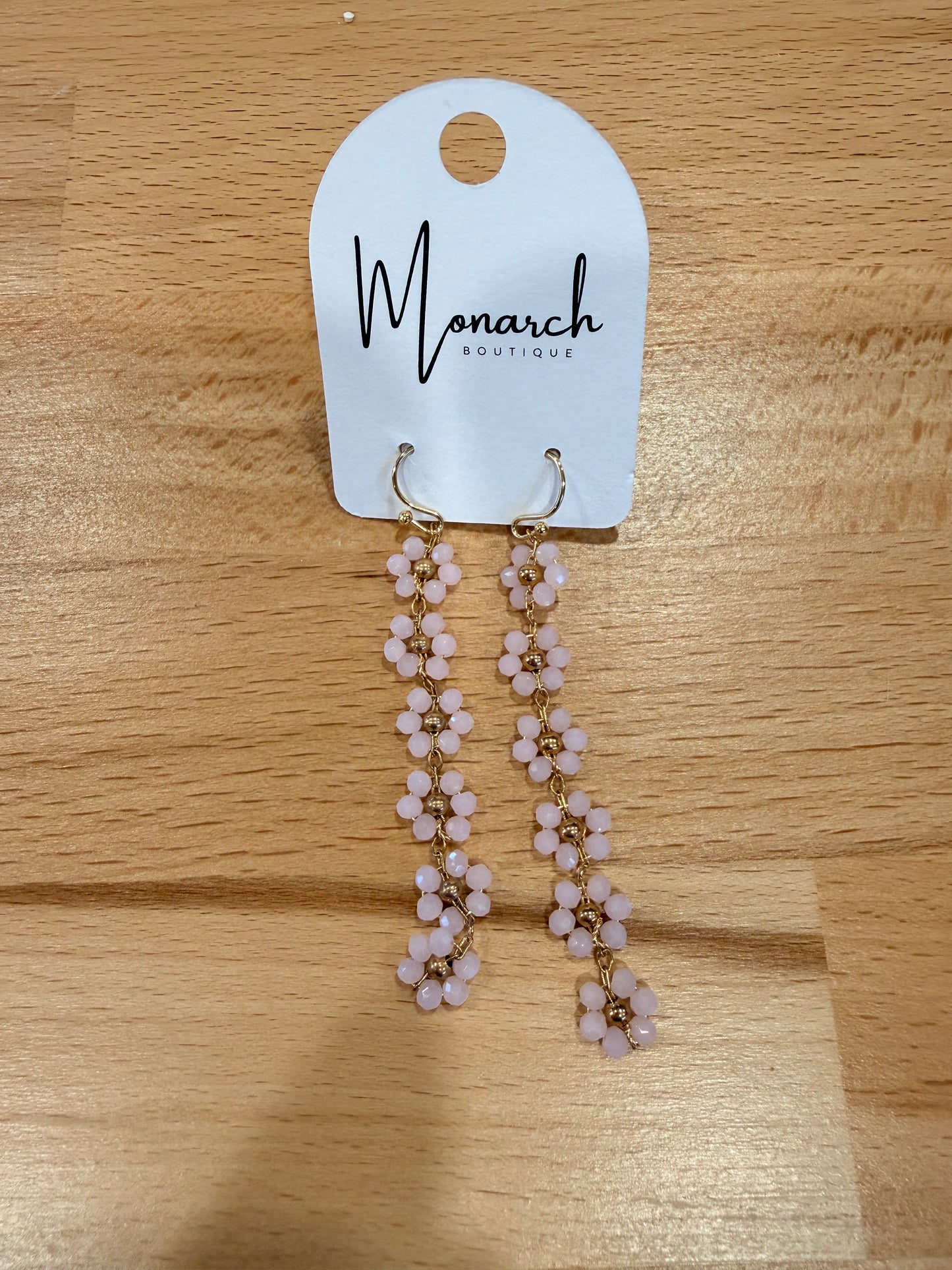 Gold beaded flower drop earrings