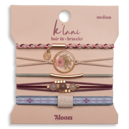 Set of hair tie-bracelets on a 'Bloom' branded card with 'kéülani' branding.