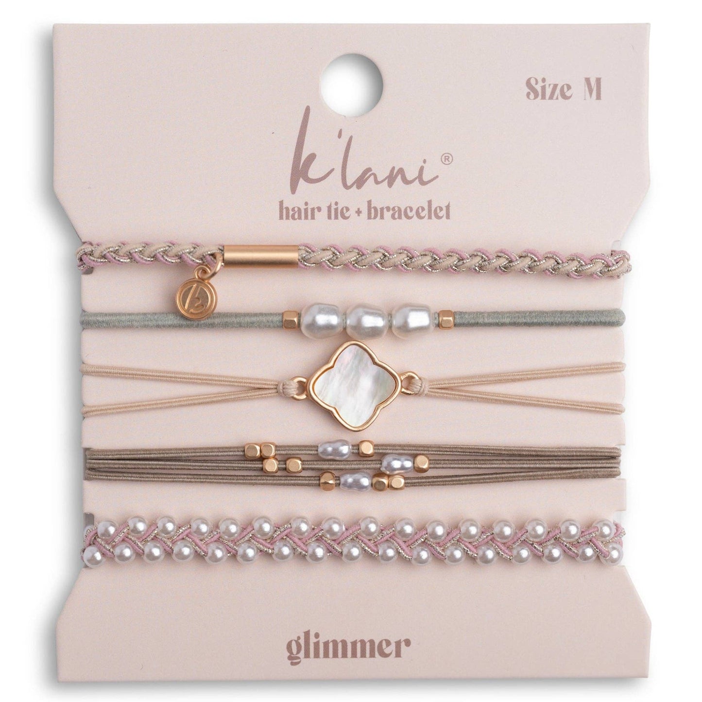 Set of hair tie and bracelets on a 'Kélani' branded card with 'glimmer' design.