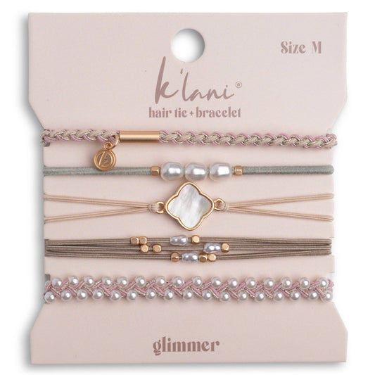 Set of hair tie and bracelets on a 'Kélani' branded card with 'glimmer' design.