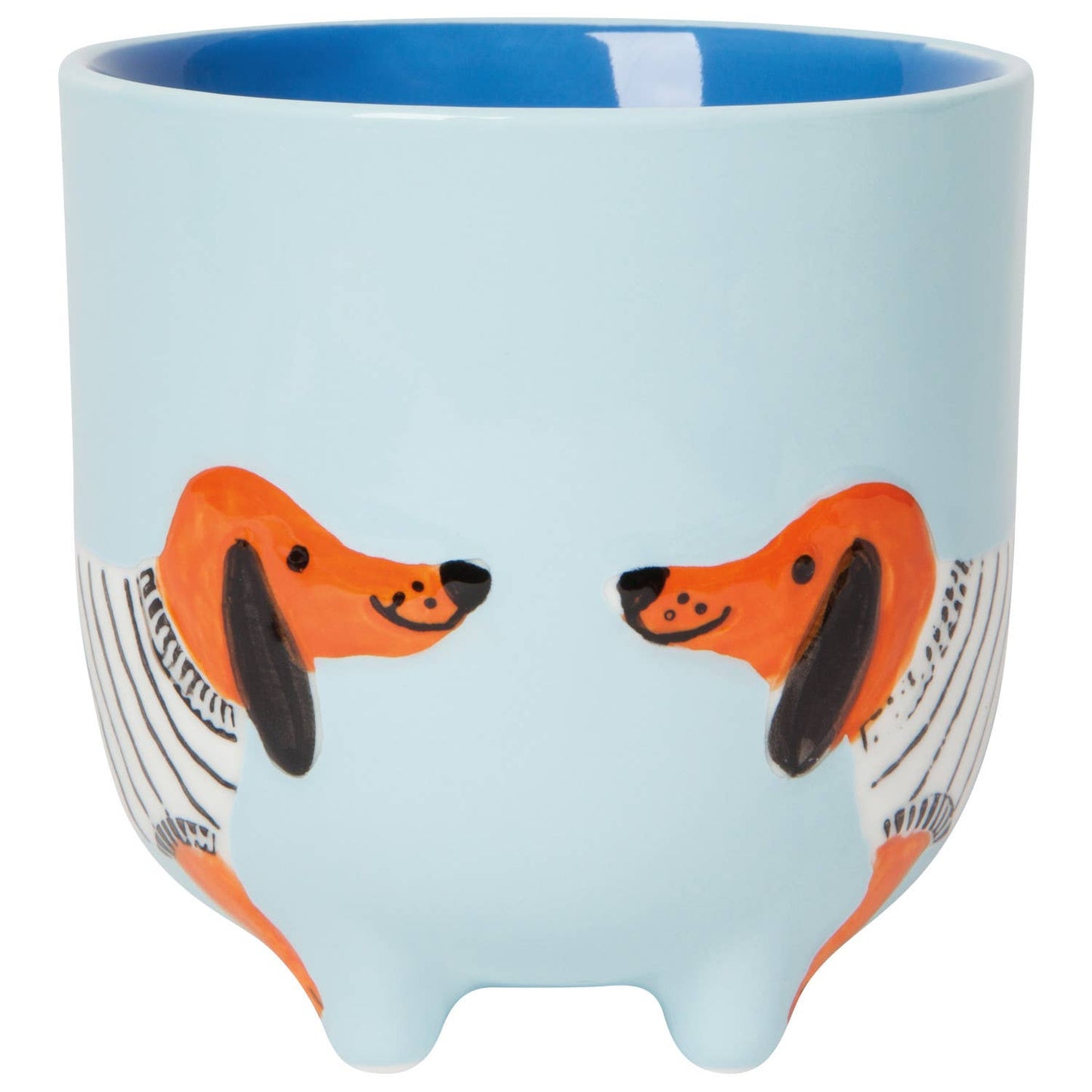 Ceramic mug with dachshund design on a light blue background