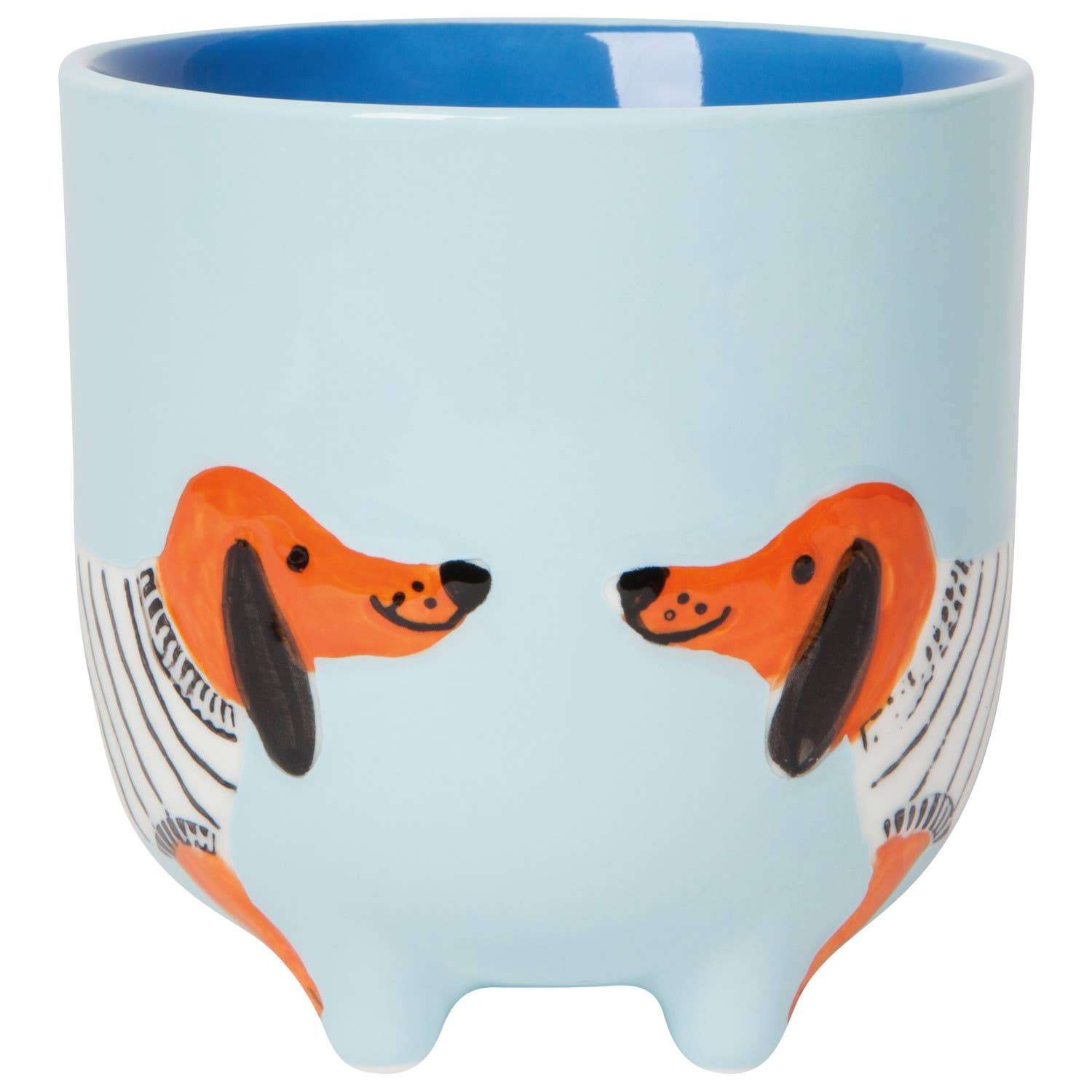 Ceramic mug with dachshund design on a light blue background