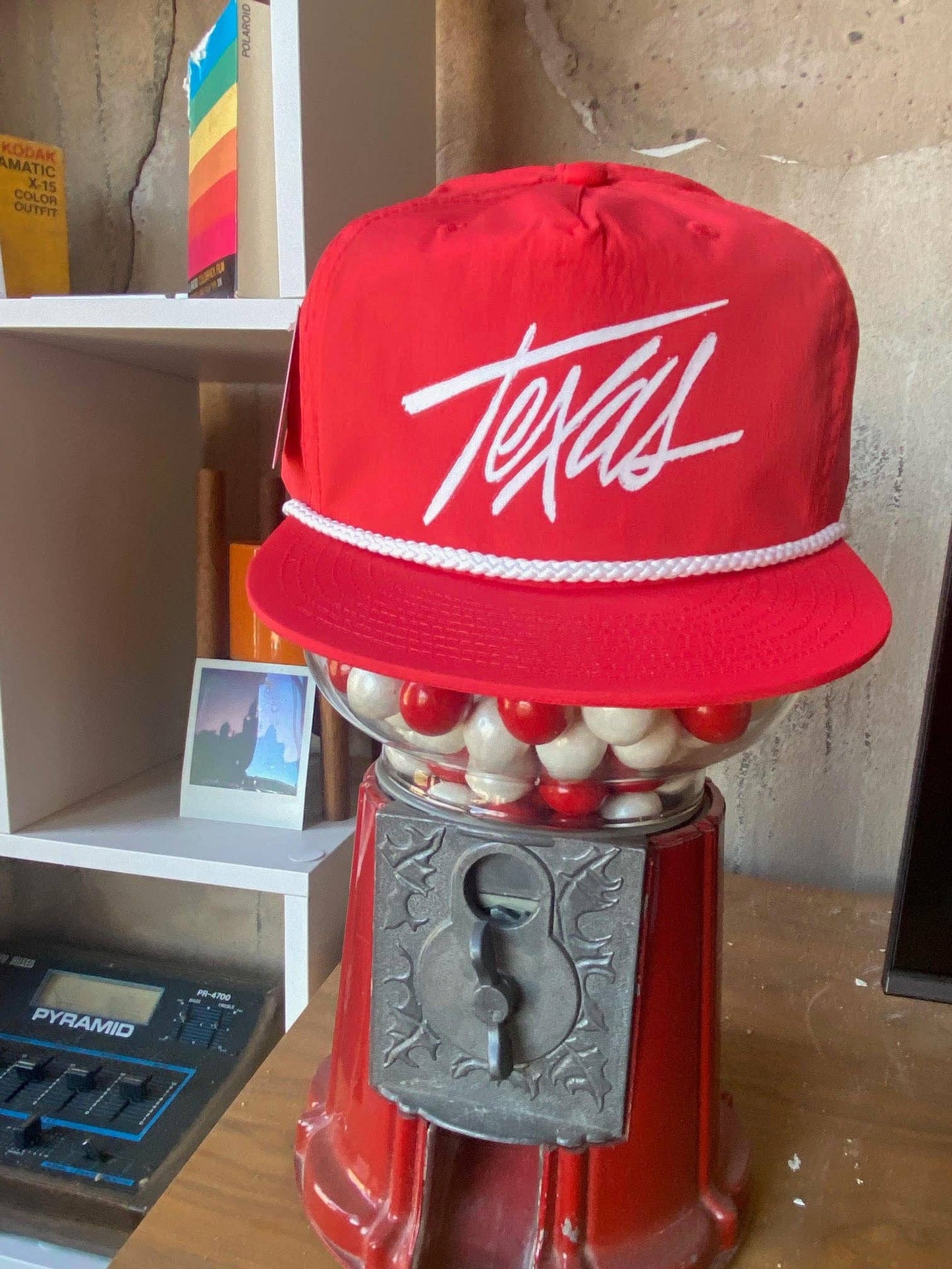 front view of red Texas script rope hat