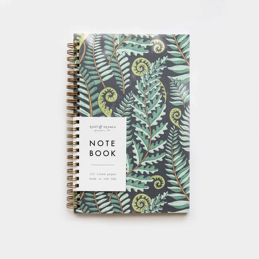 Notebook with fern pattern on a white background