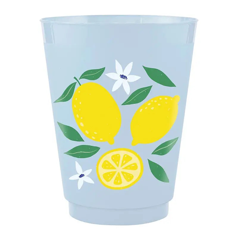 Light blue cup with lemon and flower design on a white background