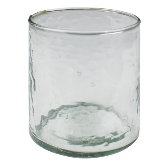 Clear glass candle holder on a white background